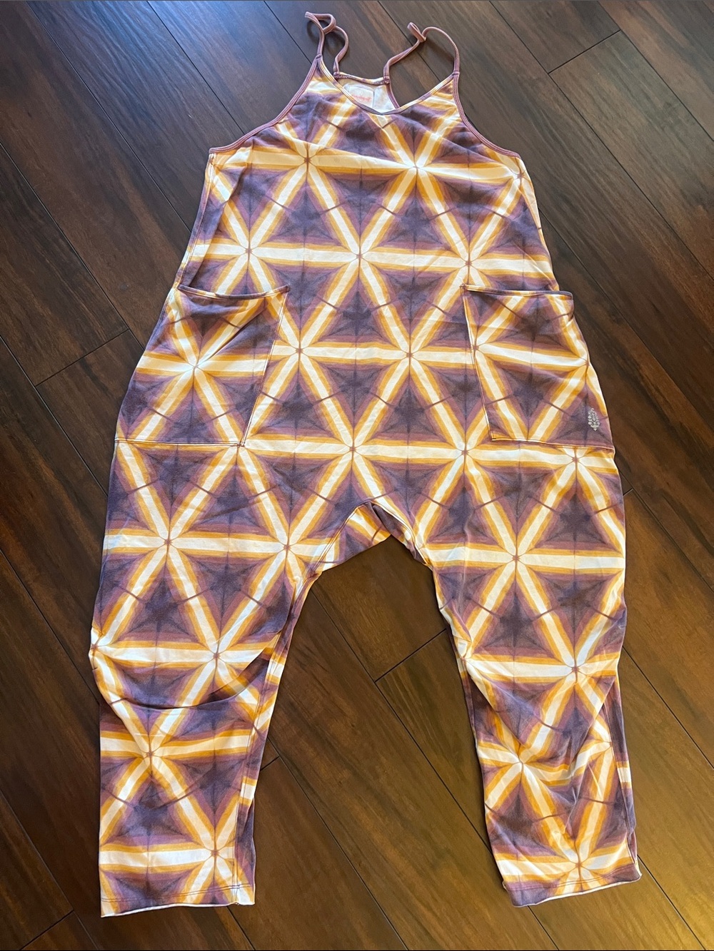 Free People movement, hot shot printed onesie, size M, like new